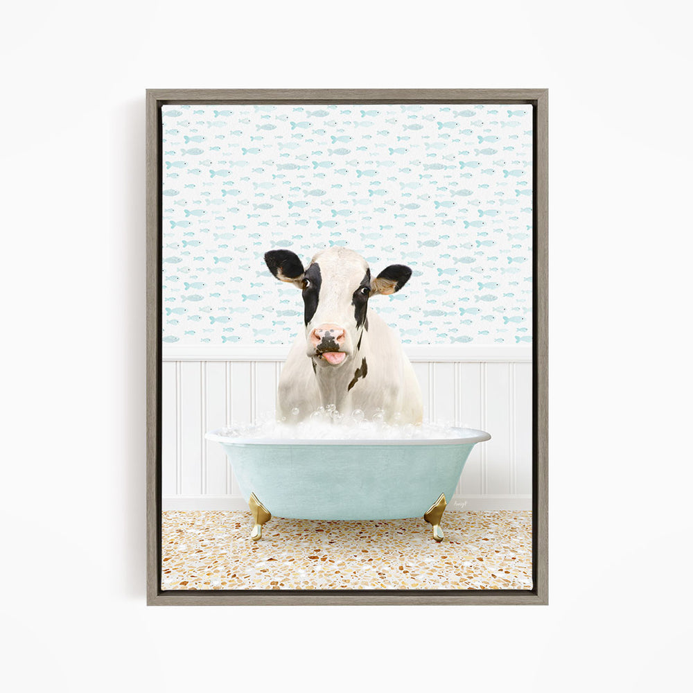 A cow is sitting in a bathtub filled with water, surrounded by a pattern of fish.