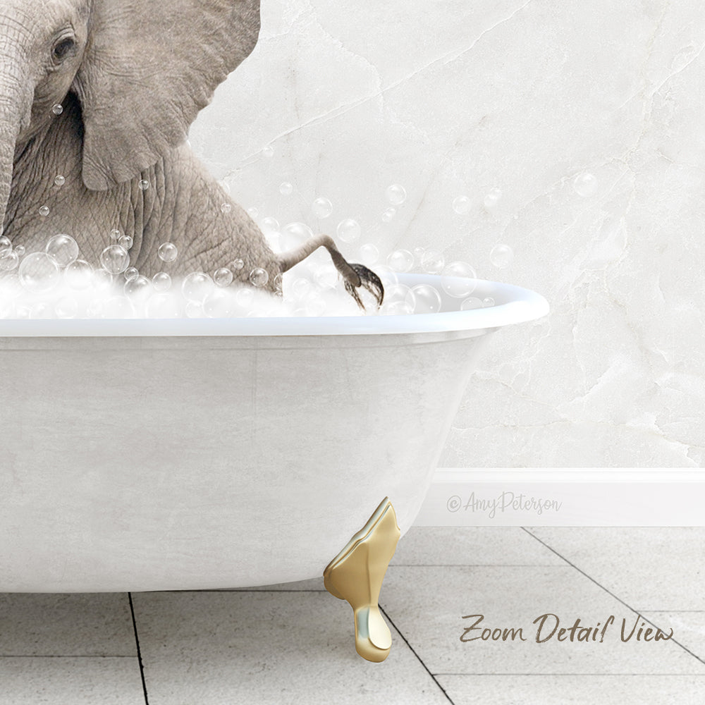 A large elephant is sitting in a white bathtub filled with bubbles, creating a whimsical and playful scene.