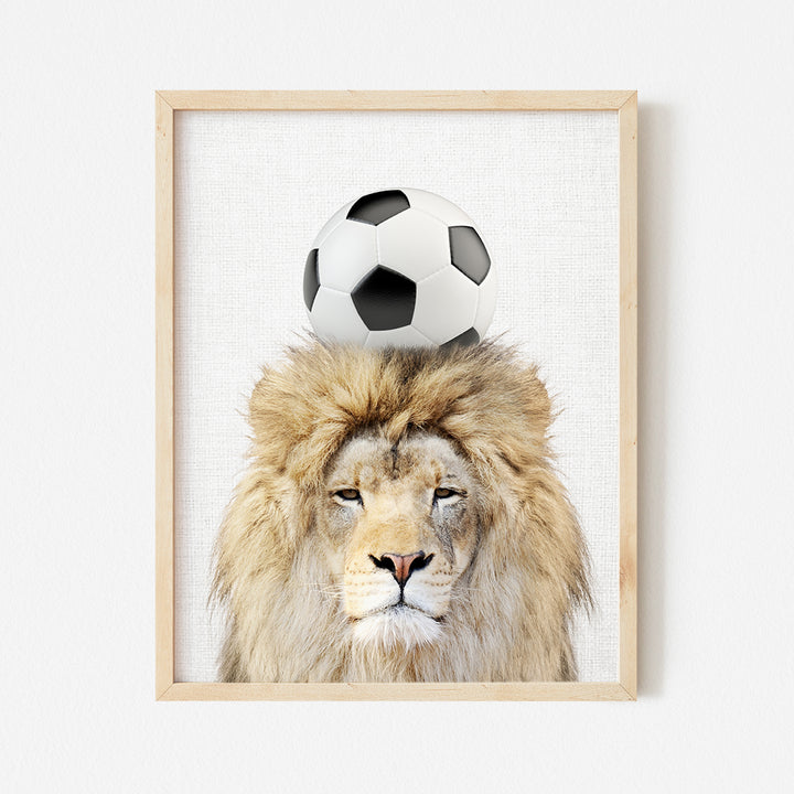 a picture of a lion with a soccer ball on its head