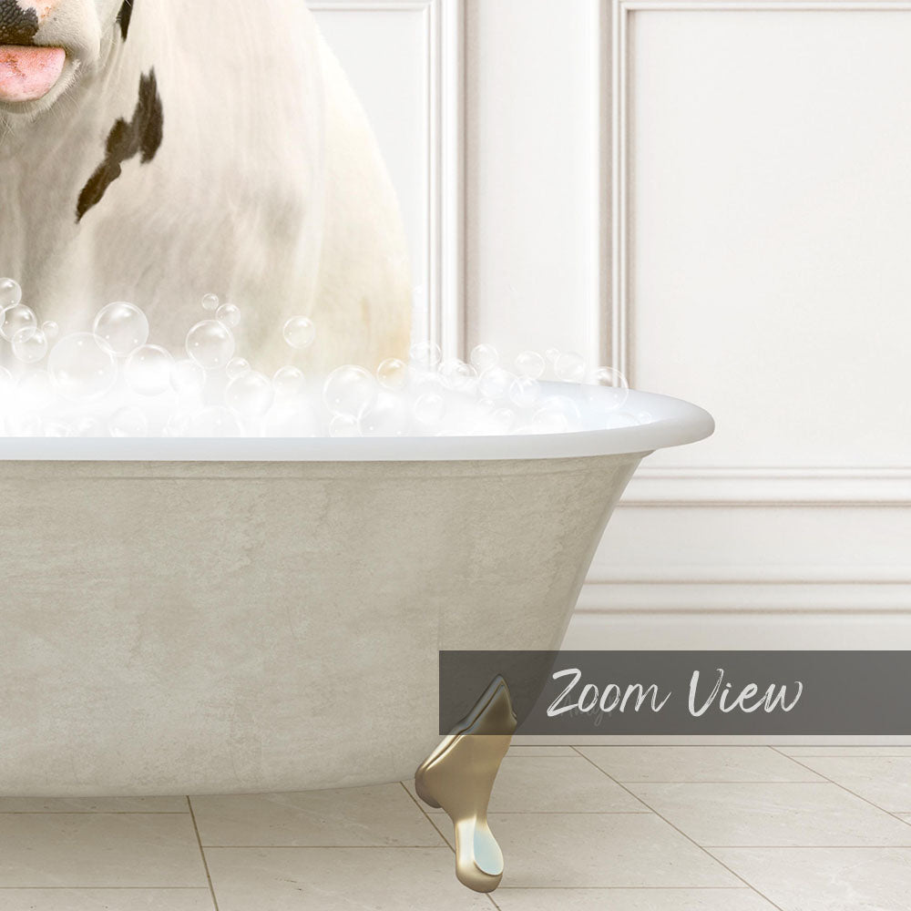 A white bathtub filled with bubbles, with a dog sitting inside and looking at the camera.