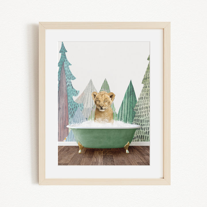 A young lion cub sitting in a green bathtub, surrounded by stylized trees in the background.
