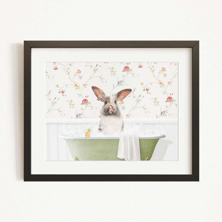 A cute rabbit sitting in a green bathtub filled with water, surrounded by a floral wallpaper.