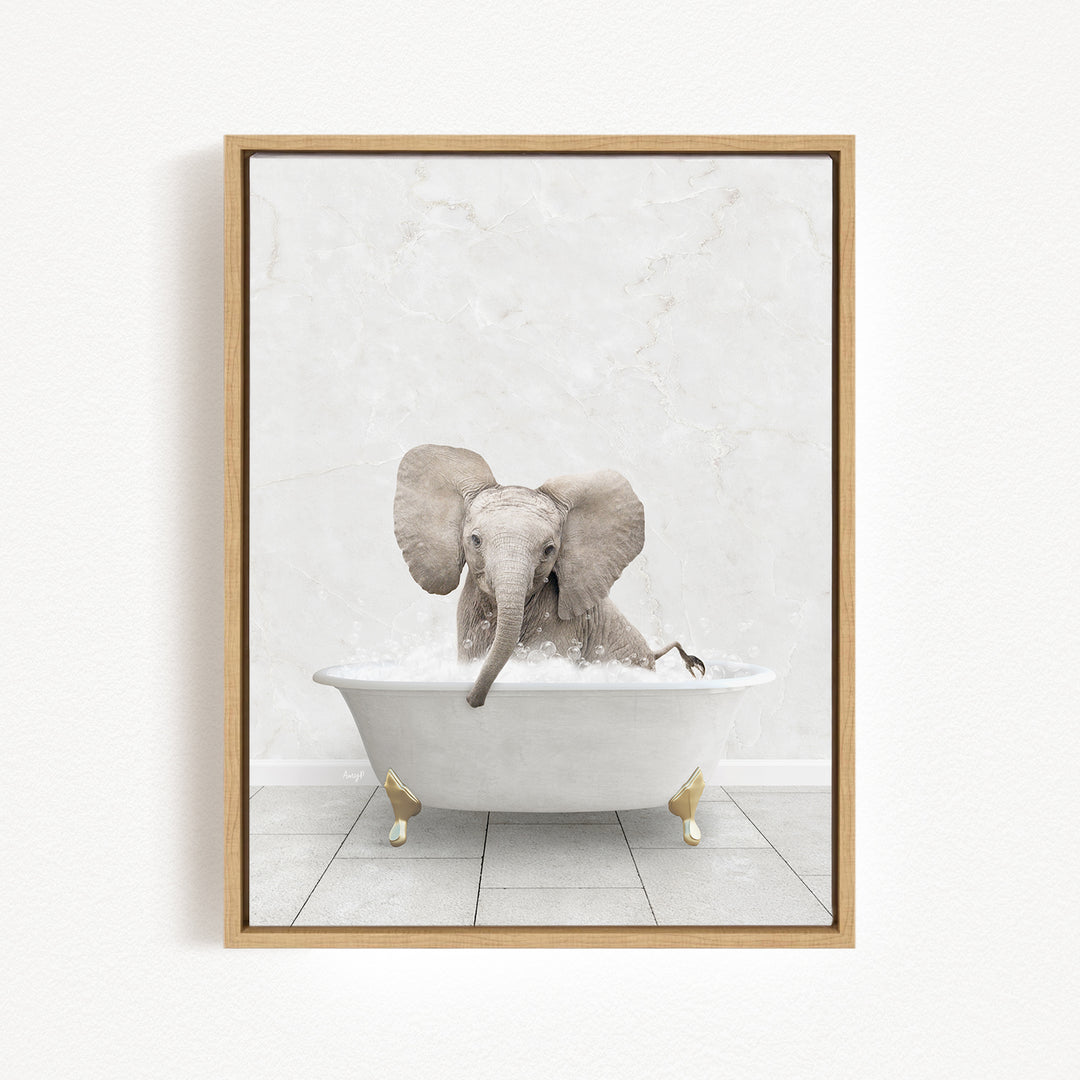 A gray elephant is sitting in a white bathtub, with its trunk submerged in the water, creating a playful and whimsical scene.