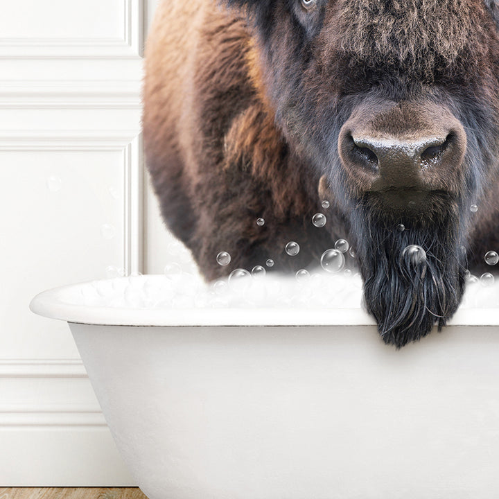 a bison is standing in a bathtub with bubbles