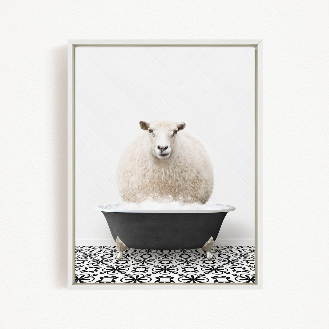 A fluffy white sheep sits in a black bathtub filled with bubbles, creating a whimsical and amusing scene.