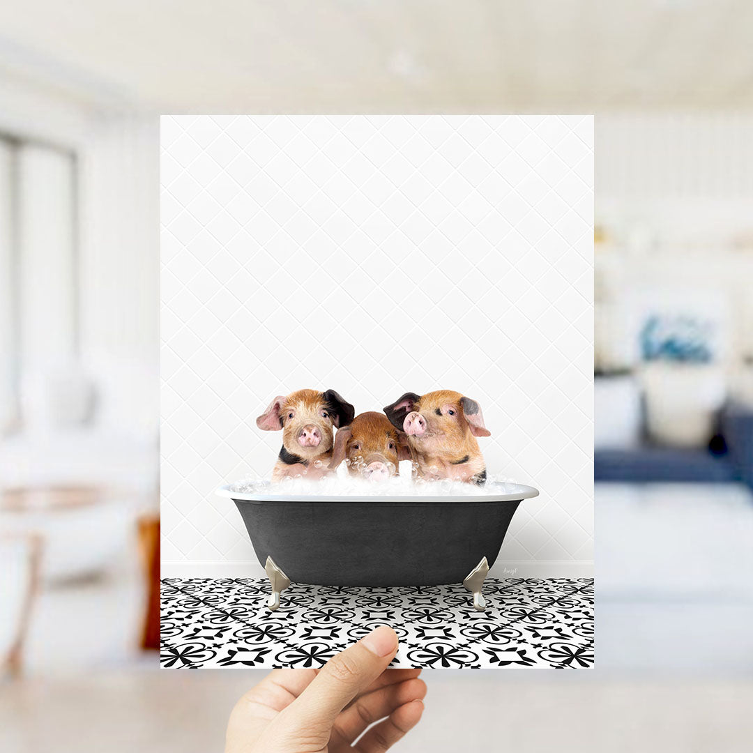 Three adorable pigs sitting in a bathtub, enjoying a relaxing bath.