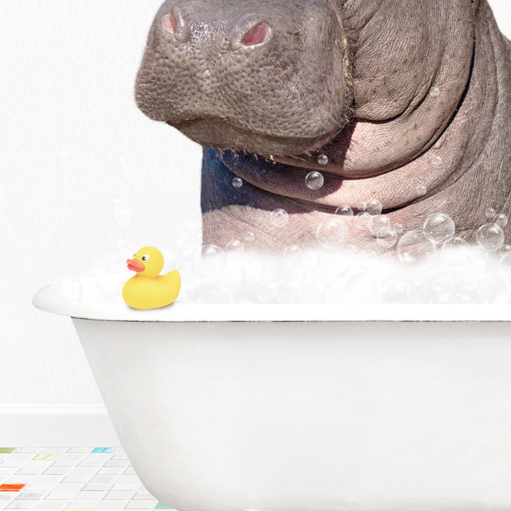 a hippopotamus in a bathtub with bubbles and a rubber duck