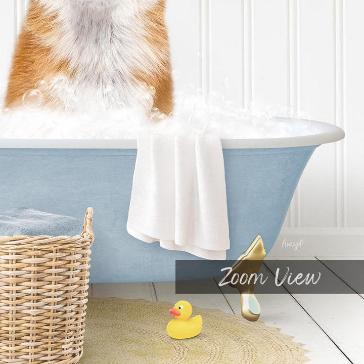 A fluffy orange and white cat sitting in a blue bathtub filled with bubbles, with a yellow rubber duck nearby and a woven basket next to it.
