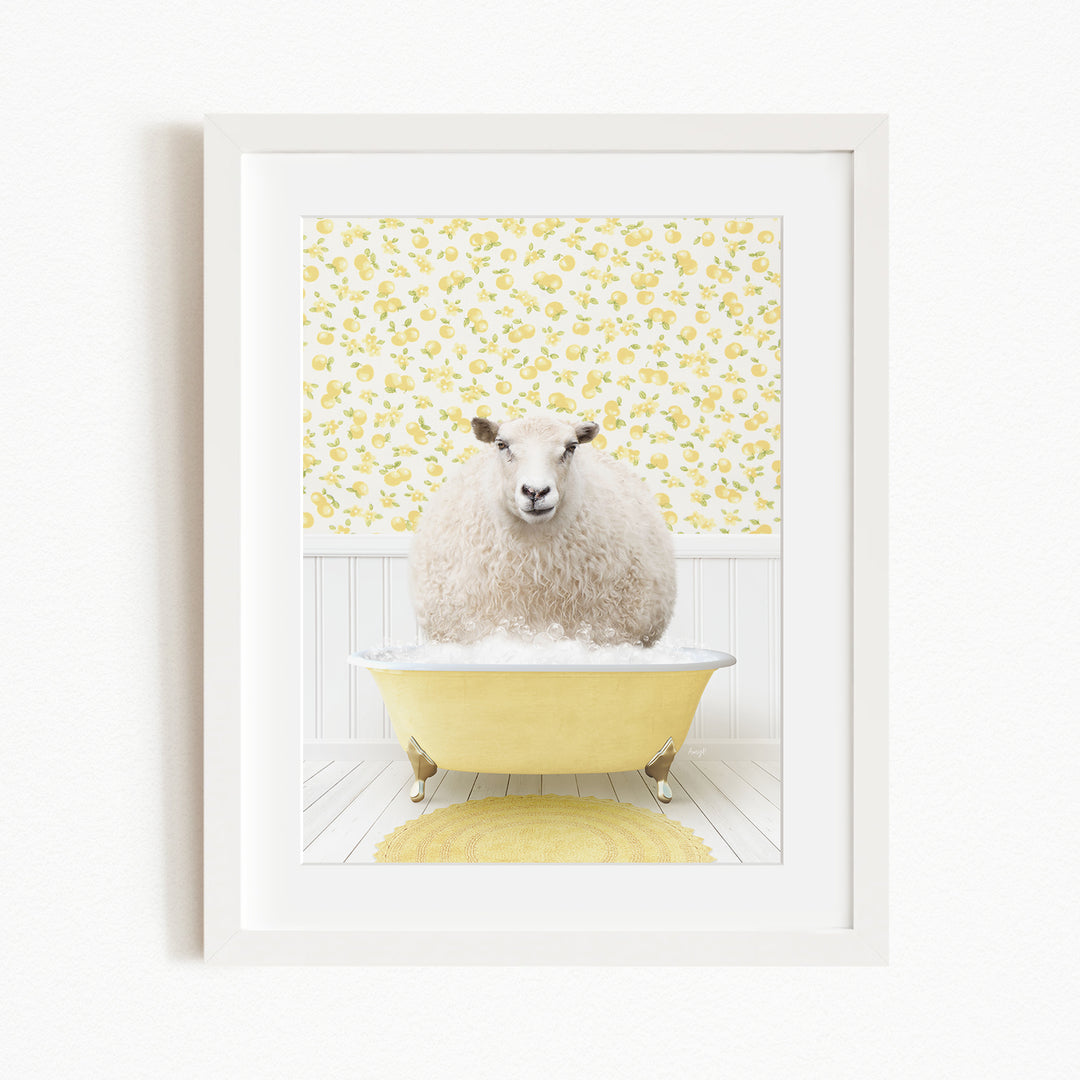 A fluffy white sheep sits in a yellow bathtub, surrounded by a yellow floral wallpaper.