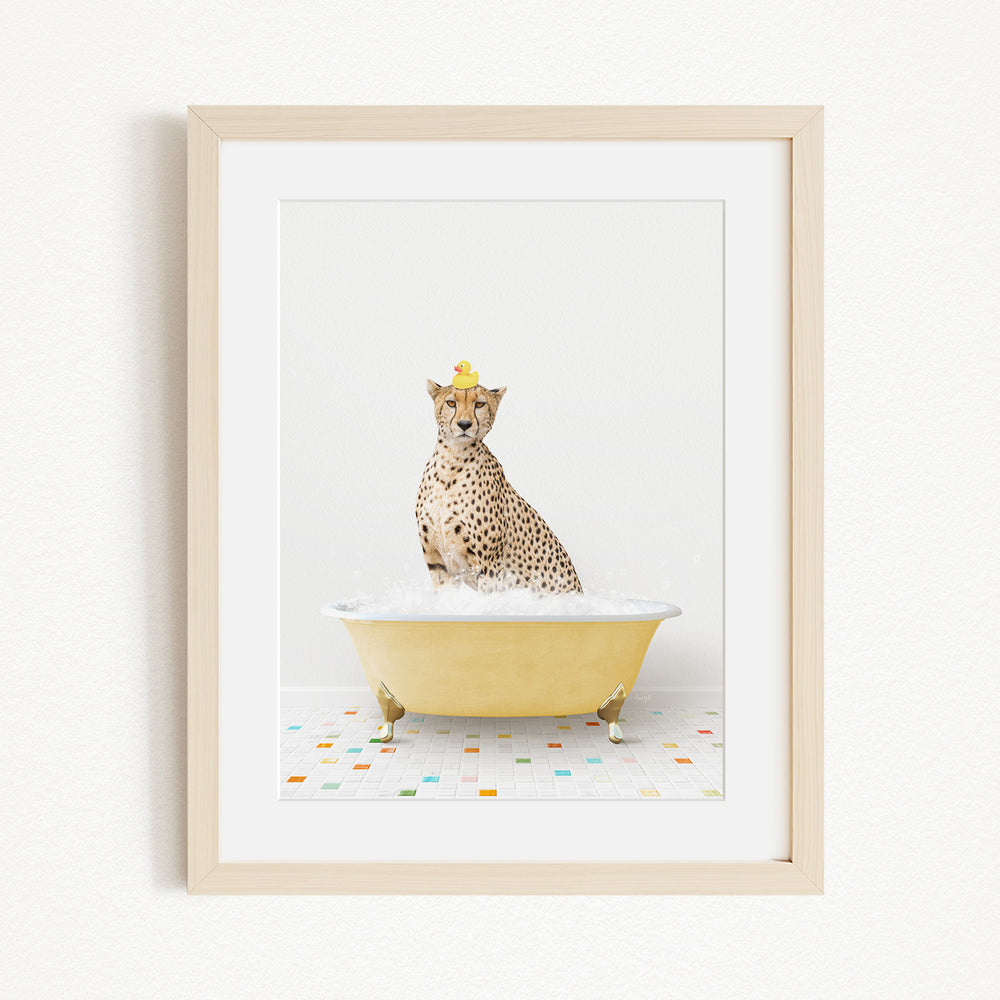 A cheetah sitting in a yellow bathtub filled with water, wearing a yellow hat.