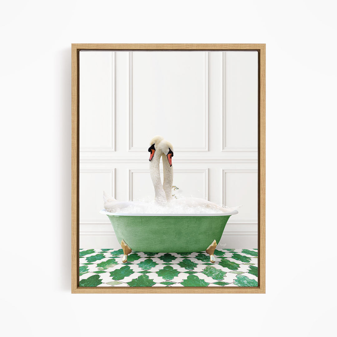 A pair of swans sitting in a green bathtub filled with bubbles, with a white wall and green and white patterned floor in the background.