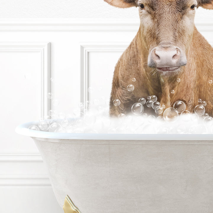 a brown cow sitting in a bathtub filled with bubbles