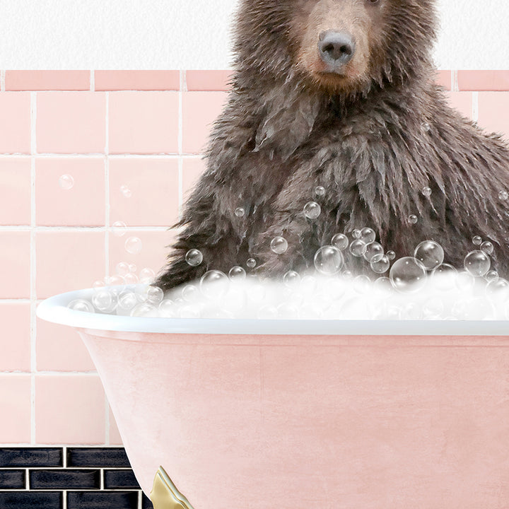 a brown bear sitting in a bathtub filled with bubbles