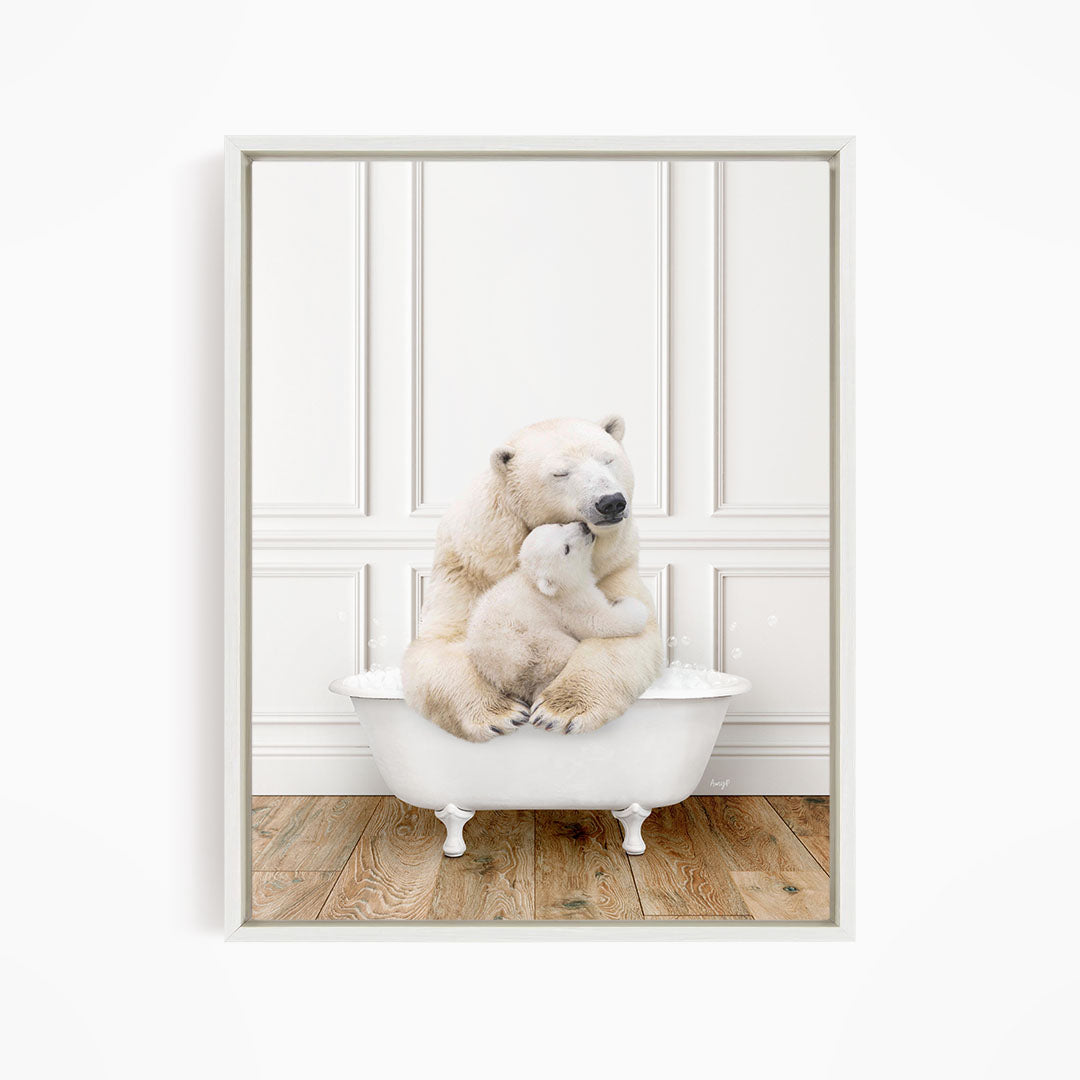 A mother polar bear and her cub cuddling in a white bathtub against a white wall.