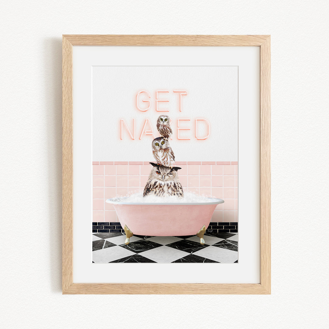 A framed image depicting a bird sitting in a pink bathtub, with the text "GET NAUGED" displayed above it.