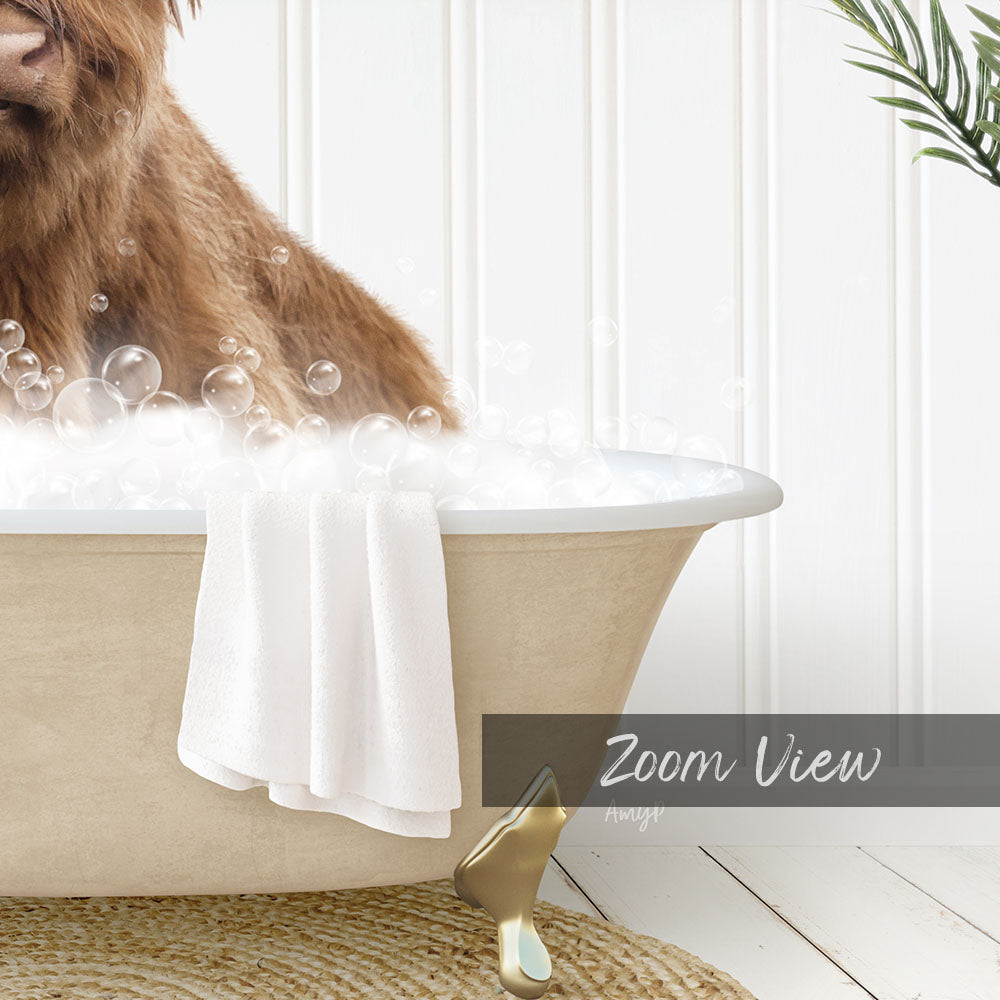 A brown dog is sitting in a bathtub filled with bubbles, with a towel and a golden object nearby.