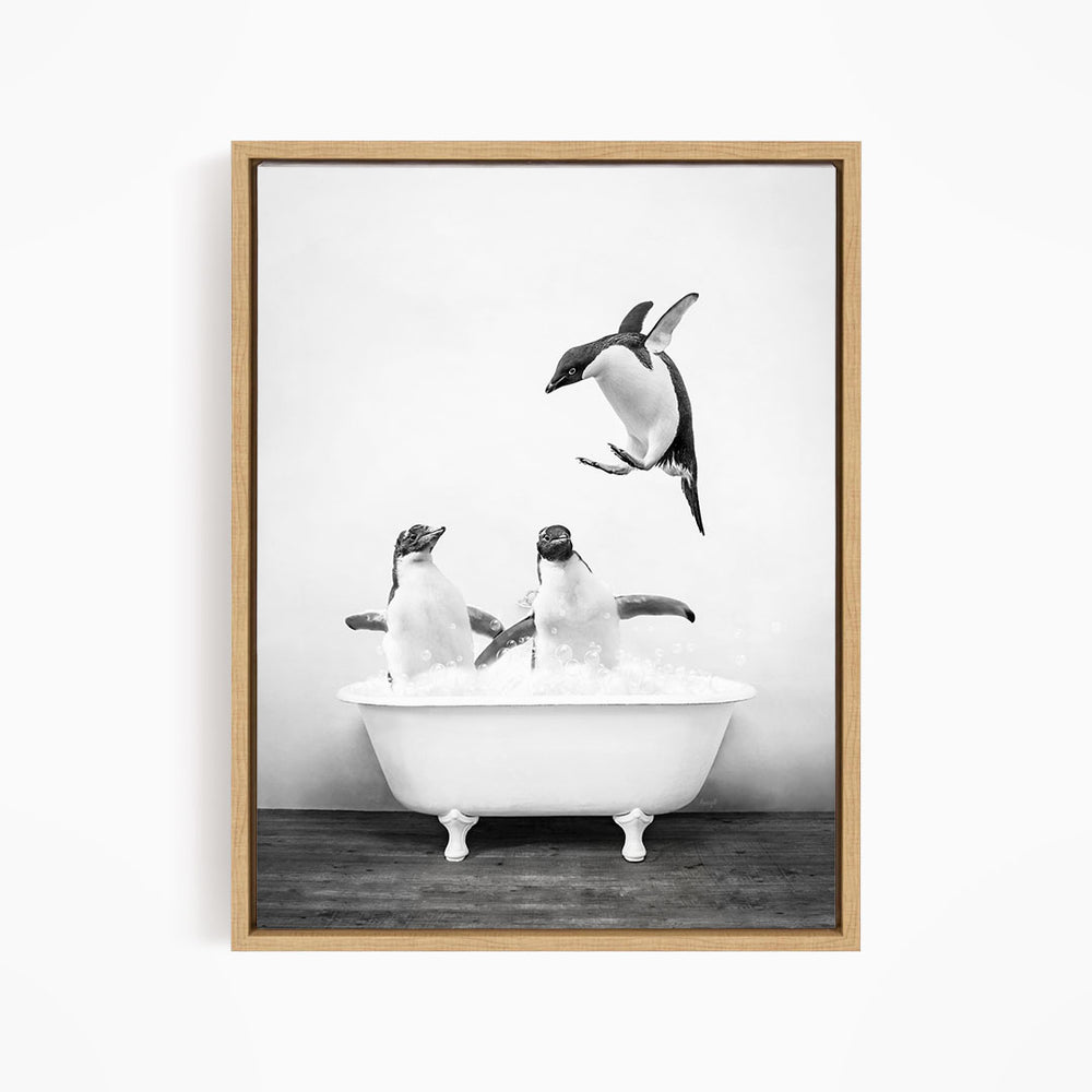 A black and white photograph of two penguins sitting in a bathtub, with one penguin flying towards the other penguin.