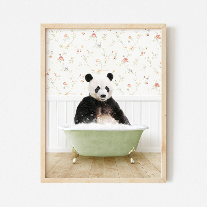 a panda bear sitting in a bath tub