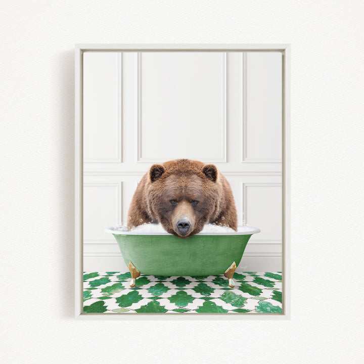 A brown bear is sitting in a green bathtub filled with water, appearing to enjoy the bath.