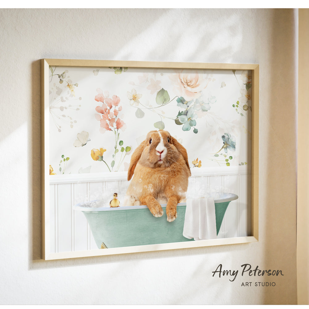 A framed print of a rabbit sitting in a bathtub filled with water and surrounded by flowers.