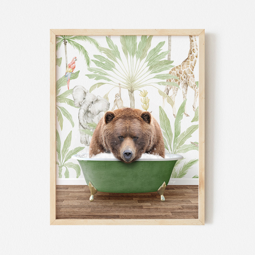 a brown bear sitting in a green bowl