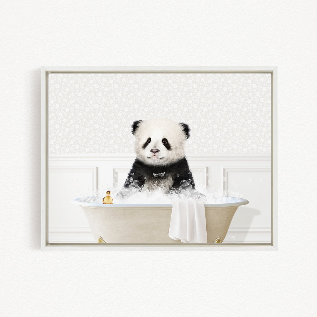 A panda bear sitting in a bathtub filled with bubbles, surrounded by a white and beige floral patterned wall.