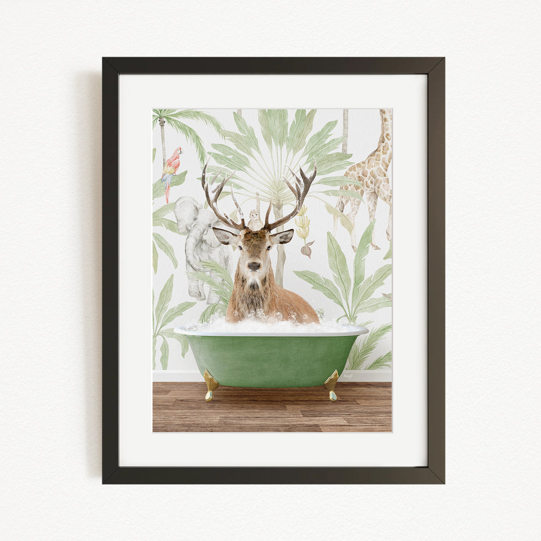 A framed image depicting a deer with antlers sitting in a green bathtub, surrounded by tropical foliage and animals.