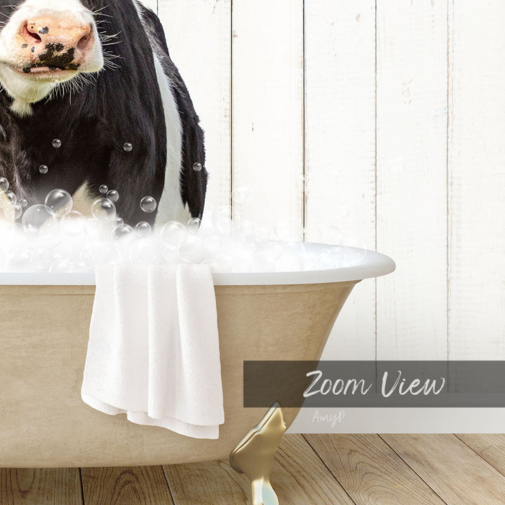 A black and white cow is standing in a bathtub filled with bubbles, with a towel hanging on the side and a "Zoom View" text overlay.