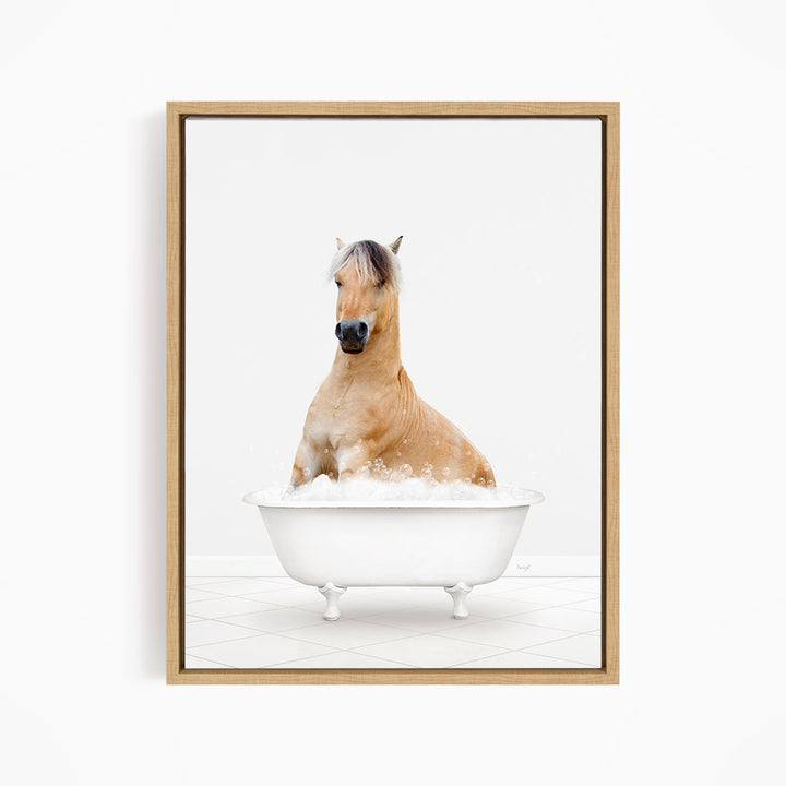 A brown horse sitting in a white bathtub filled with bubbles, looking directly at the camera.