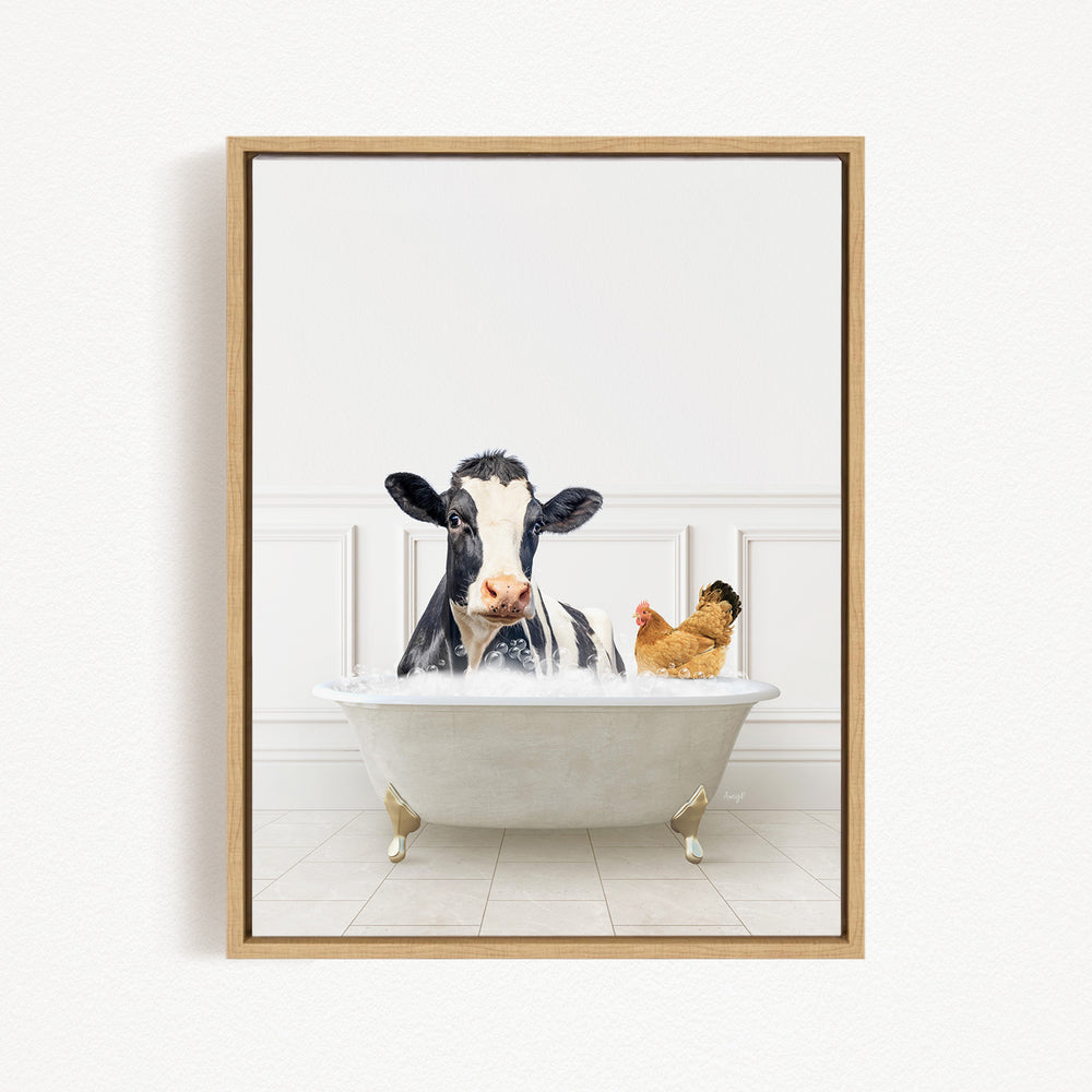 A black and white cow is sitting in a white bathtub, with a chicken standing nearby, in a white-walled room.