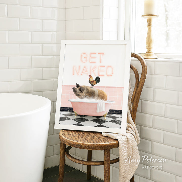 A framed image of a cat sitting in a bathtub, with the text "GET NAKED" displayed on the frame.