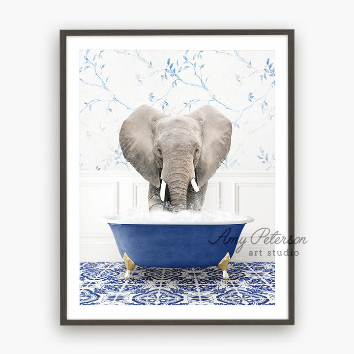 a picture of an elephant taking a bath