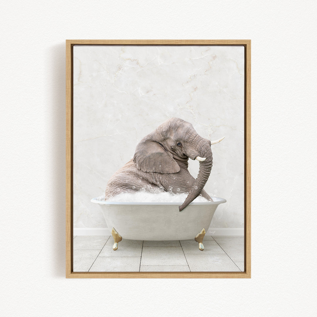 A gray elephant sitting in a white bathtub filled with water, with its trunk submerged in the water.