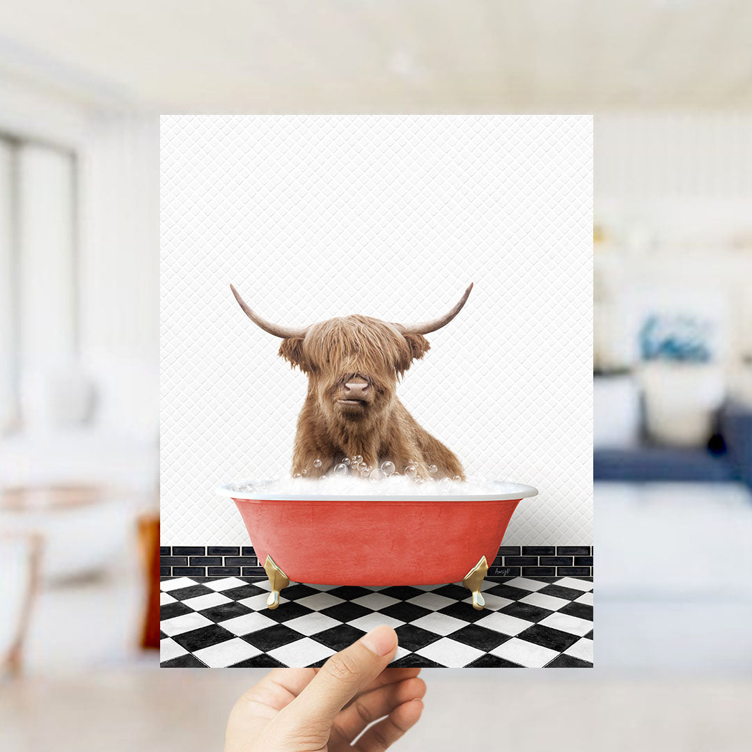 A brown cow with long horns is sitting in a red bathtub filled with water, creating a whimsical and humorous scene.