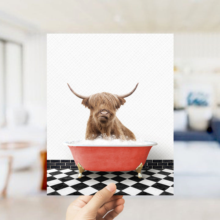 A brown cow with long horns is sitting in a red bathtub filled with water, creating a whimsical and humorous scene.