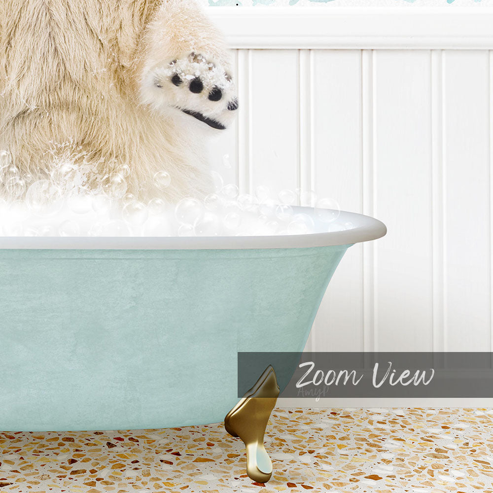 A fluffy white dog is standing in a light blue bathtub filled with bubbles, with its paw raised in the air.
