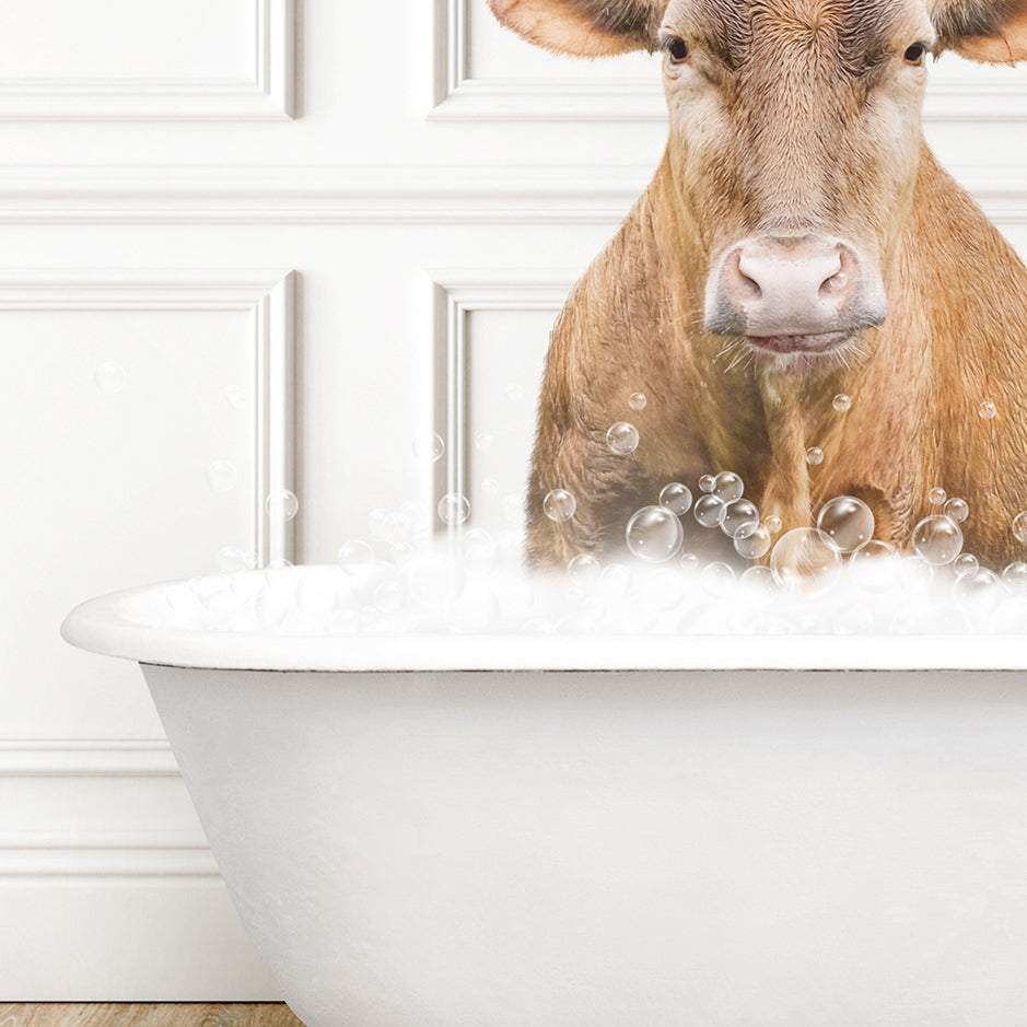 a cow is sitting in a bathtub with bubbles