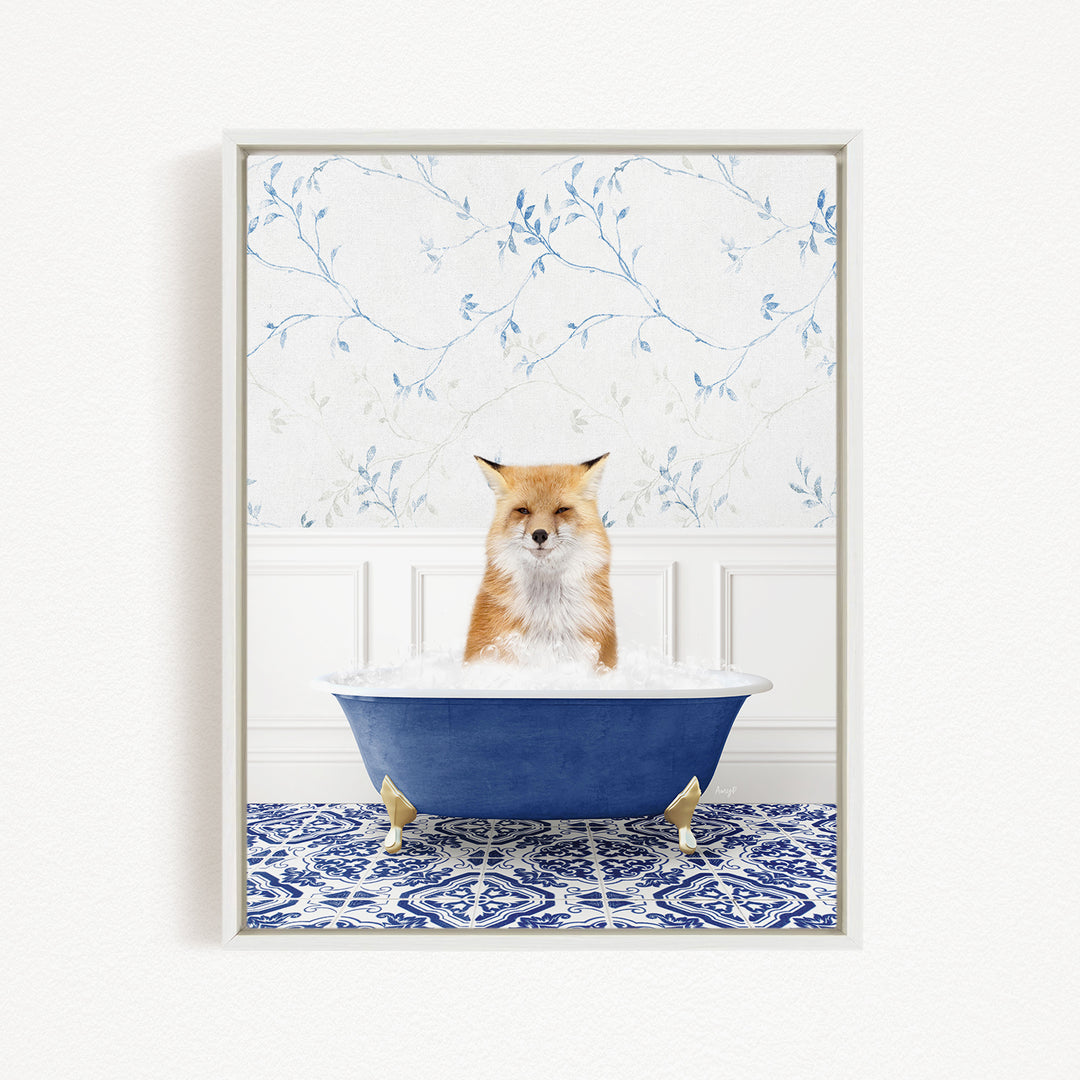A red fox sitting in a blue bathtub filled with bubbles, with a blue and white floral patterned wall behind it.