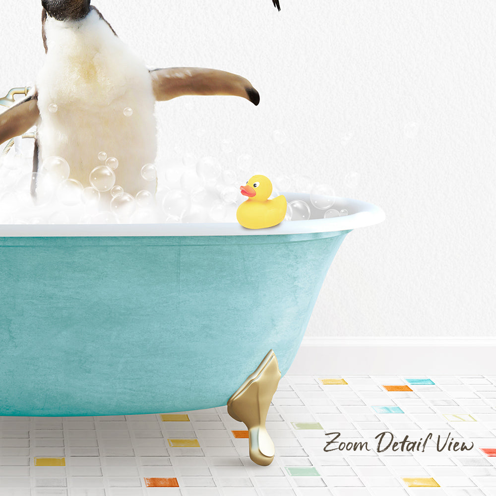 A penguin standing in a blue bathtub filled with bubbles, with a yellow rubber duck floating on the water.
