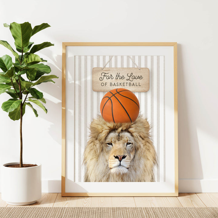 A framed image of a lion with a basketball on its head, accompanied by a sign that reads "For the Love of Basketball".