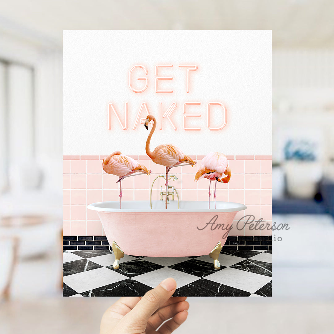 a person holding up a card with flamingos in a bathtub