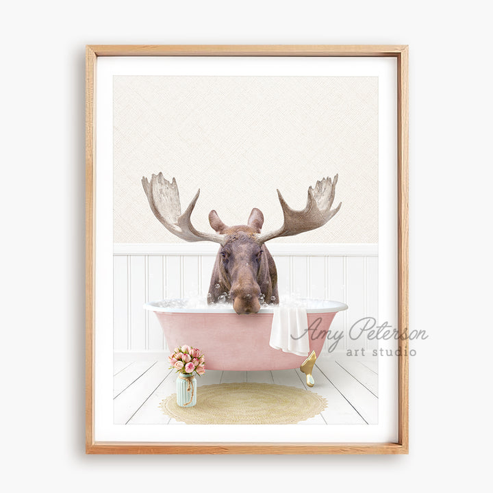 a picture of a moose taking a bath