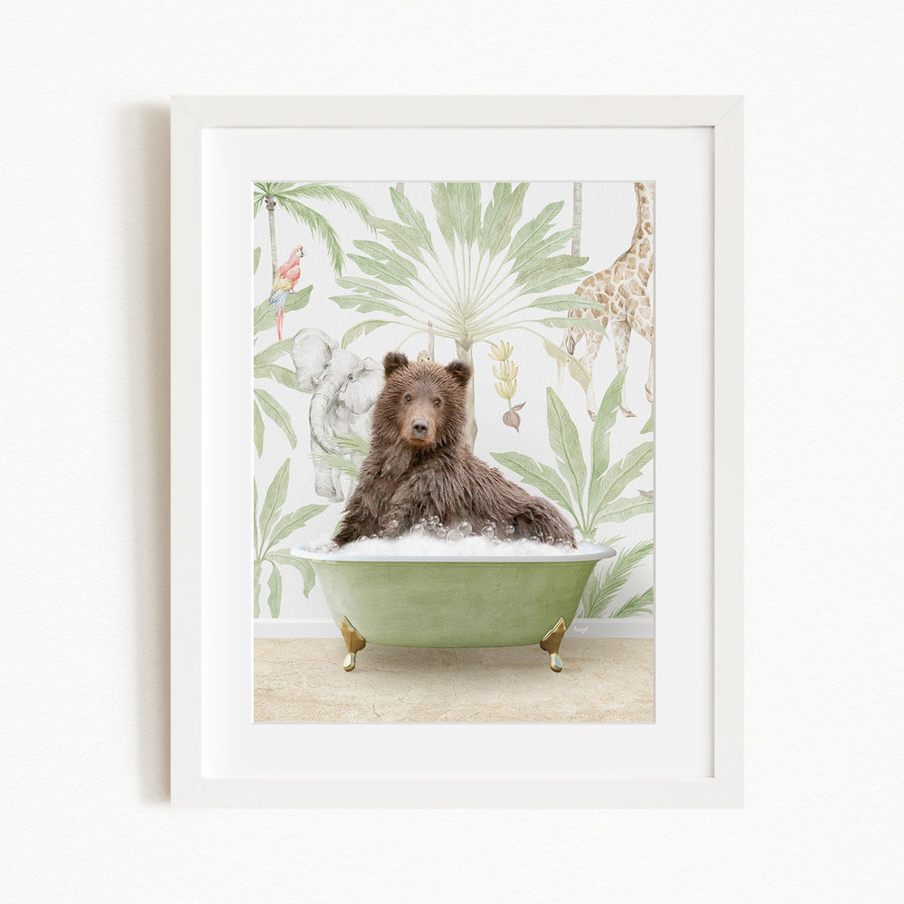A brown bear is sitting in a green bathtub, surrounded by a tropical wallpaper with various animals, including a giraffe and an elephant.