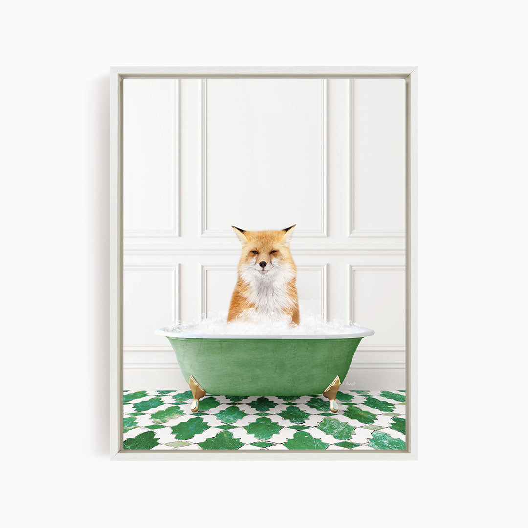 A red fox is sitting in a green bathtub filled with bubbles, looking directly at the camera.