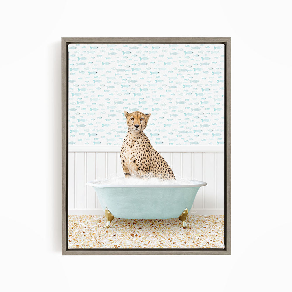 A cheetah sitting in a blue bathtub filled with water, surrounded by a pattern of fish.