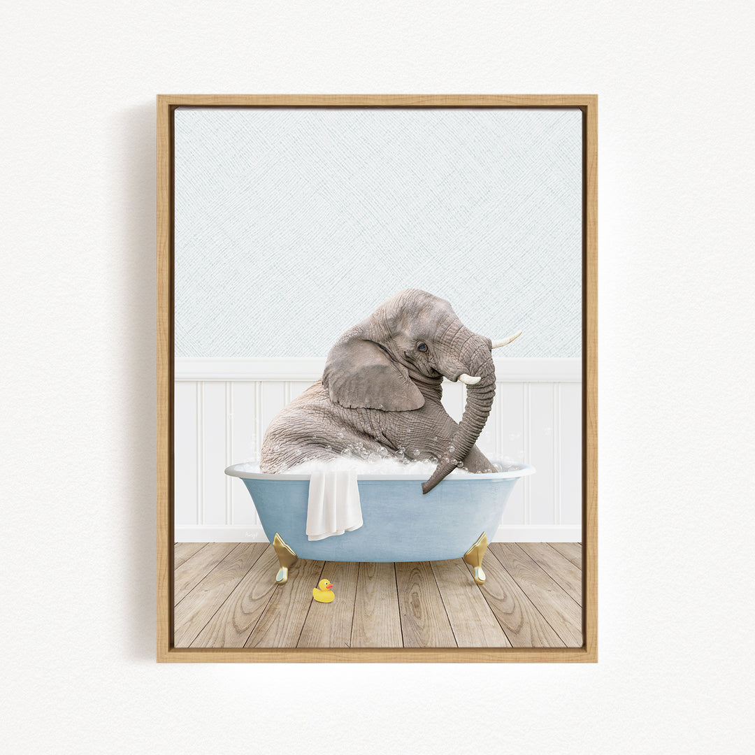 A gray elephant is sitting in a blue bathtub filled with water, surrounded by a white wall and wooden floor.