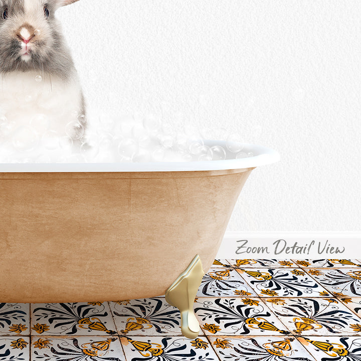 A small rabbit is sitting in a bathtub filled with bubbles, with a patterned tile floor visible beneath it.