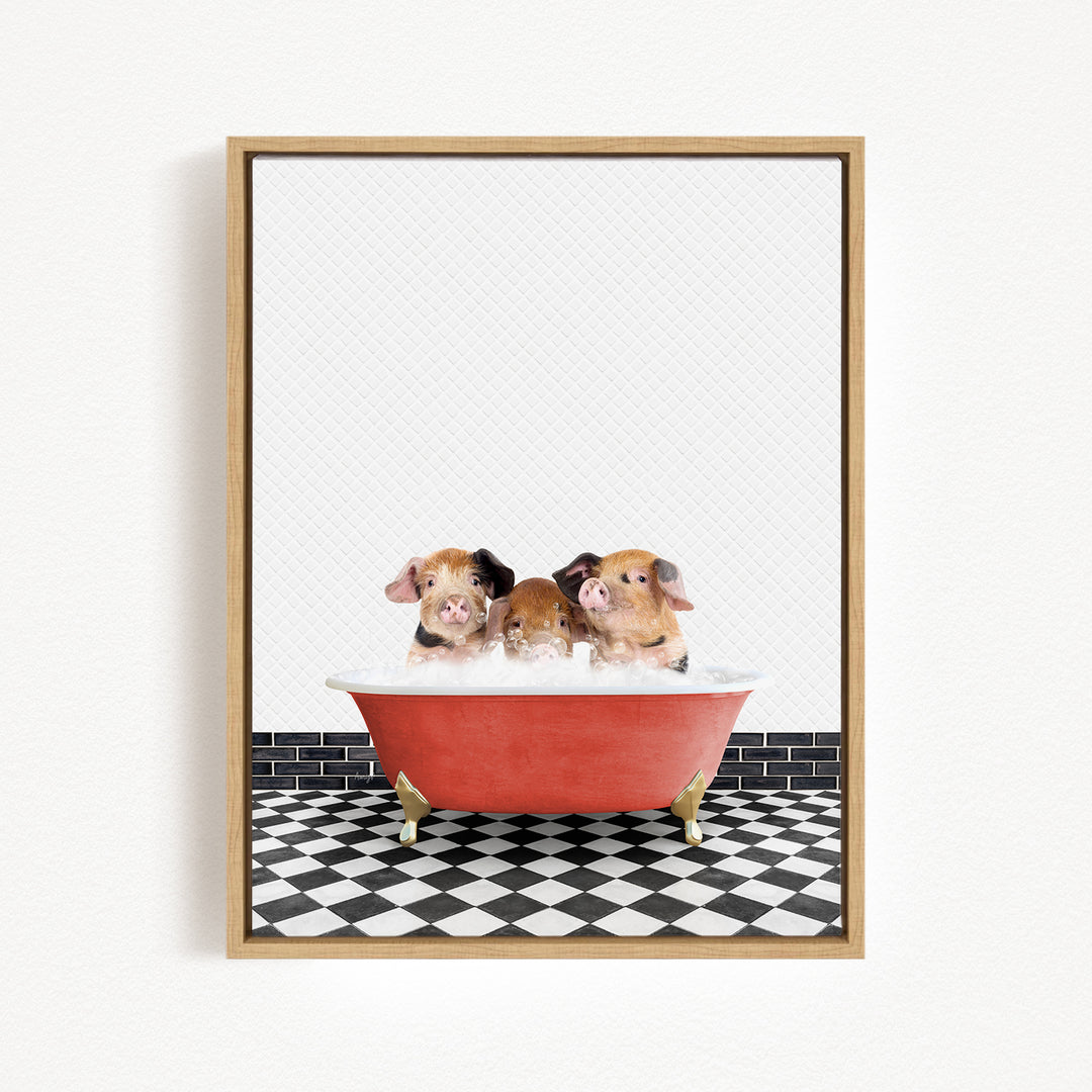 Three adorable pigs sitting in a red bathtub on a black and white checkered floor.