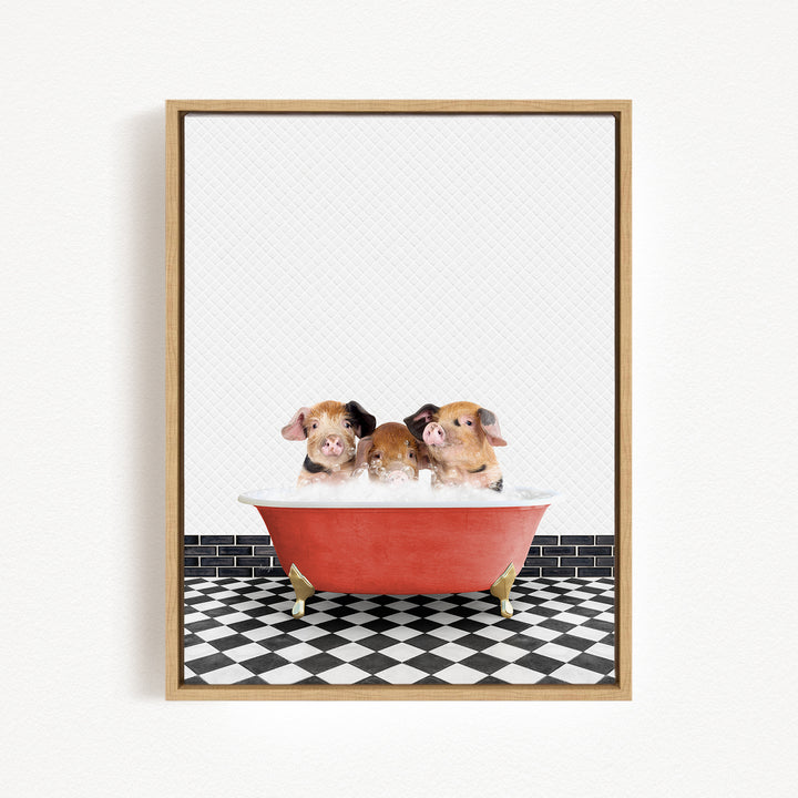 Three adorable pigs sitting in a red bathtub on a black and white checkered floor.