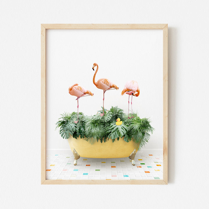 a group of flamingos sitting on top of a bath tub